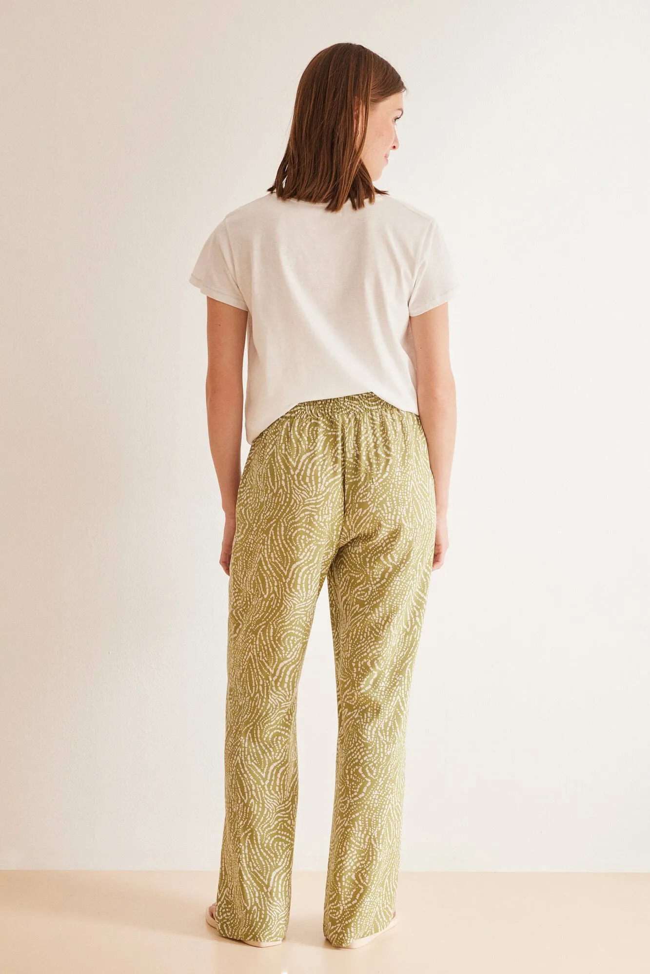 Green ethnic print trousers